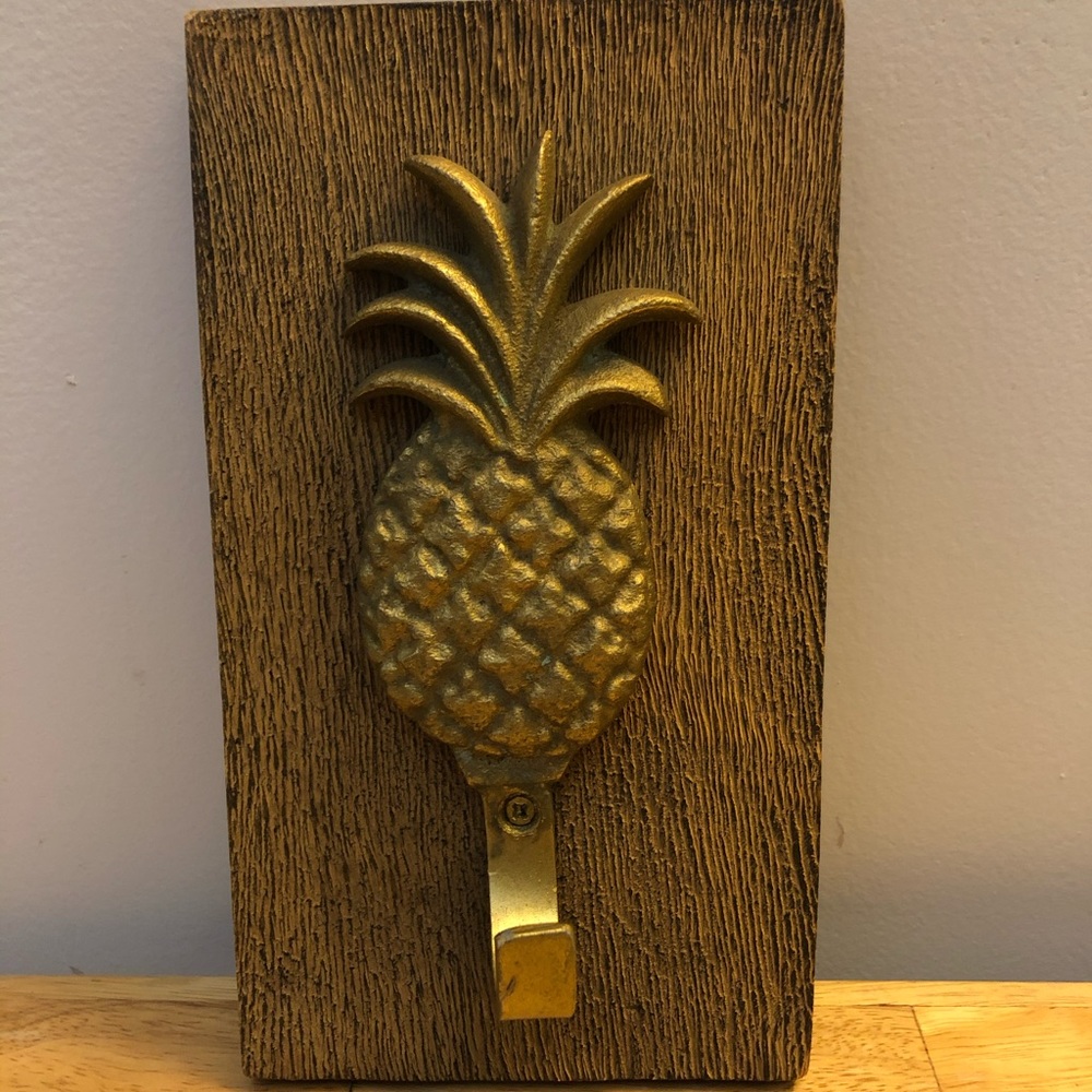 Wood-mounted brass pineapple wall hook